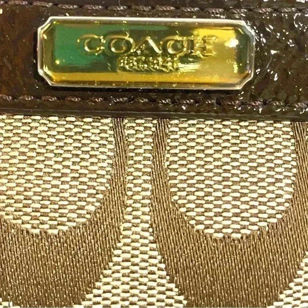 Coach CC signature print canvas wristlet